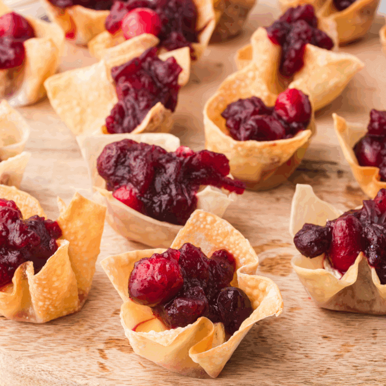 Air Fryer Cranberry Brie Bites with brie cheese, cranberry sauce, and flaky pastry.