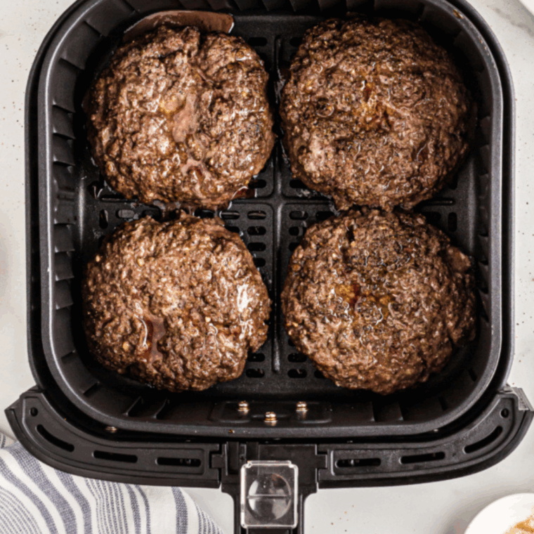 Copycat A&W Buddy Burger cooked in the air fryer basket.