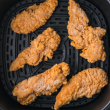 Tyson Air Fried Chicken placed into the air fryer basket.