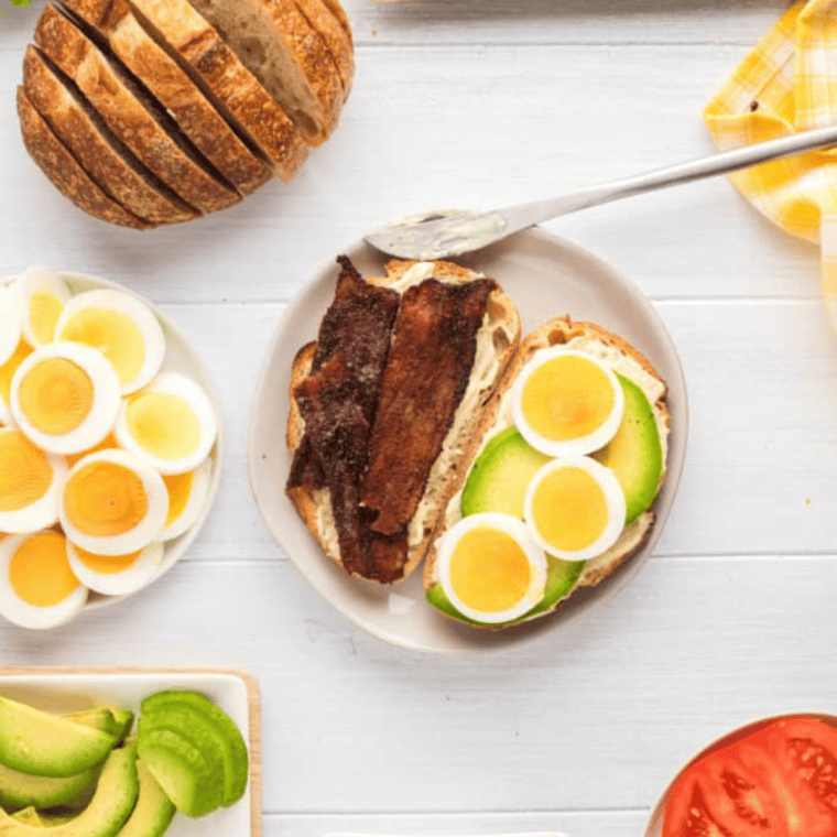 Crispy Air Fryer Millionaire’s Bacon coated with caramelized brown sugar and spices on a serving tray.