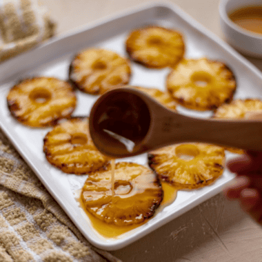 Honey Glazed Air Fryer Pineapple slices golden and caramelized on a plate
