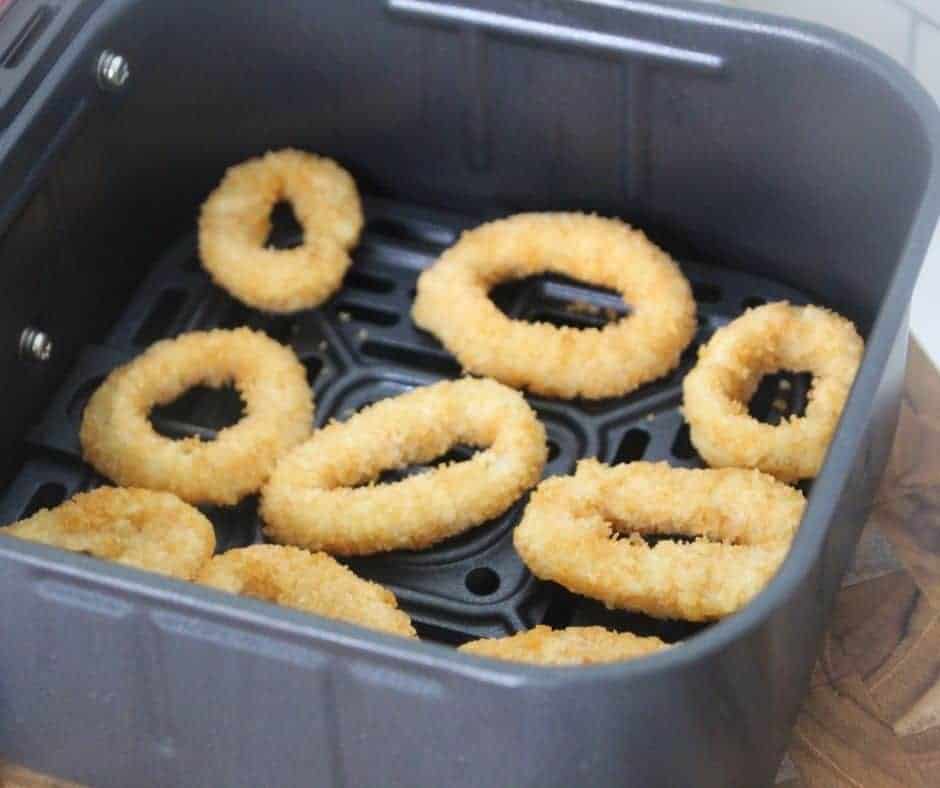 frozen squid in an air fryer basket