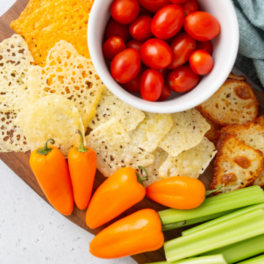 Plate of golden air fryer cheese crisps, a crispy 5-minute keto cheese chip snack