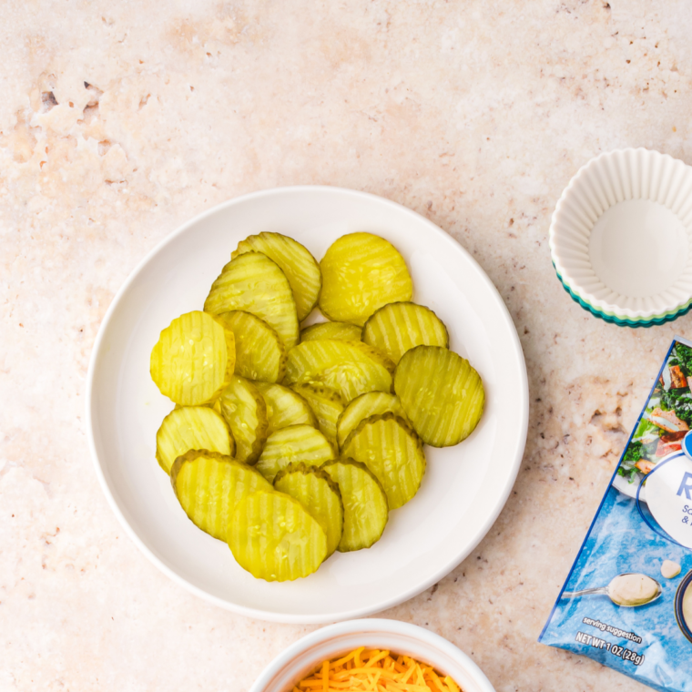 Ingredients needed for Air Fryer Copycat Texas Roadhouse Pickles on kitchen table.