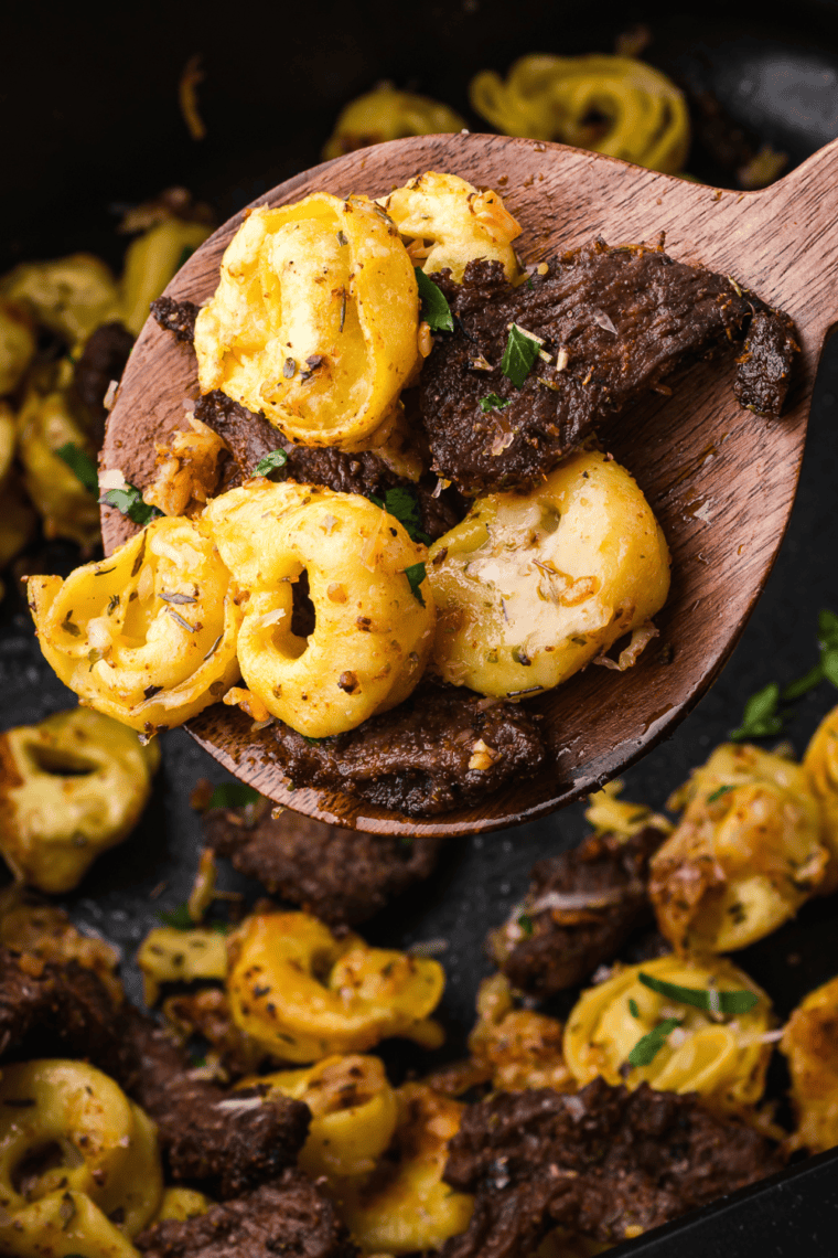 Air-fried Parmesan-crusted steak with a golden, crispy coating, perfectly cooked and juicy on the inside.