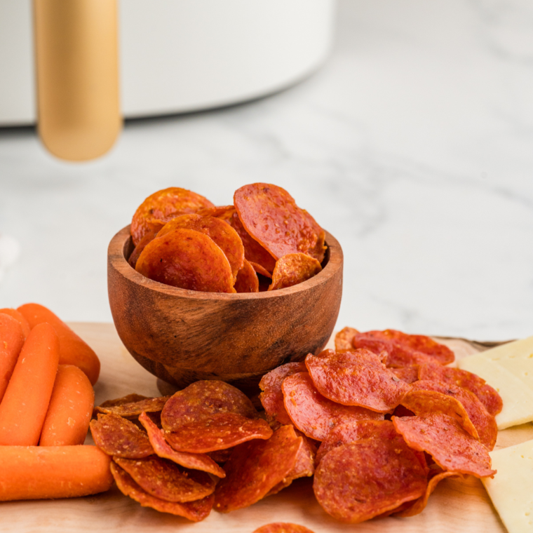 Air Fryer Pepperoni Chips served with fresh vegetables and dips.