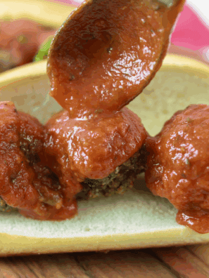 Golden, crispy Air Fryer Italian Sausage Balls served on a plate, ready to be enjoyed with a dipping sauce.