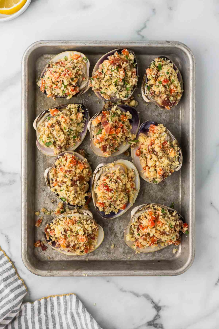 Quahog shells filled with breadcrumb stuffing before going into the air fryer