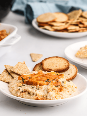 Hot crab dip is a savory dish that can be served as an appetizer or a meal. It's perfect for any occasion and has only a few ingredients, making it easy to make! This recipe teaches you how to make the best hot crab dip ever.