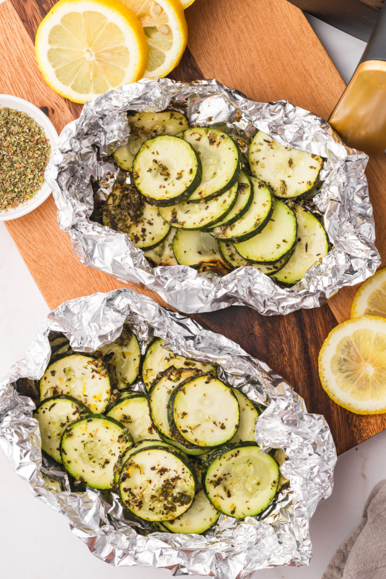 Crispy air fryer zucchini slices golden brown on plate with light seasoning