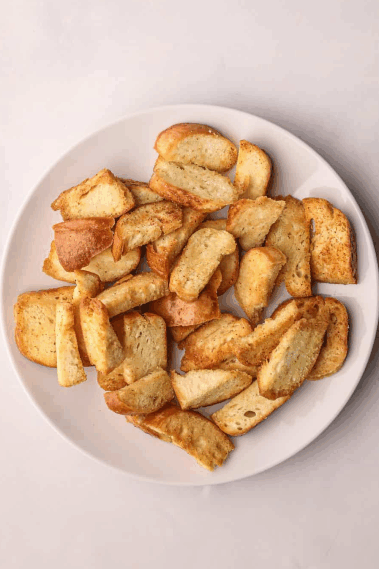 Crispy golden air fryer everything bagel chips served in a bowl.