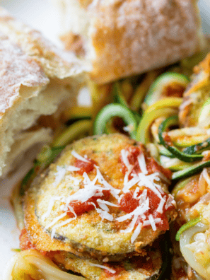 "Air fryer zucchini noodles cooked until tender and lightly crisp, served in a bowl as a low-carb pasta alternative."