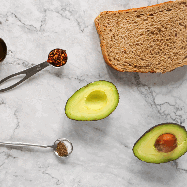 Ingredients needed for Air Fryer Avocado Toast on kitchen table.