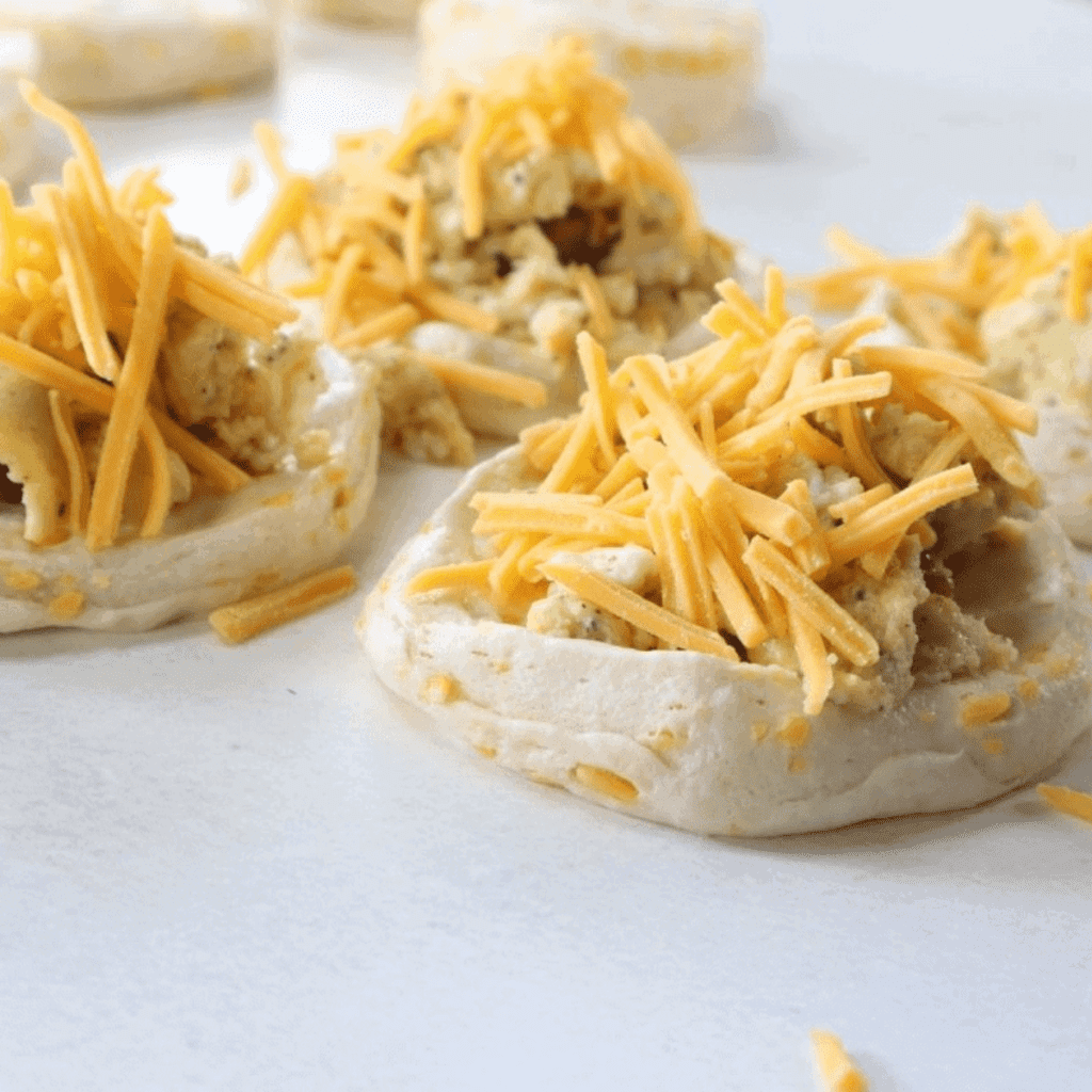 egg bombs with cheese on top