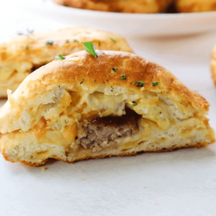 Air Fryer Breakfast Bombs on table, cut in half.