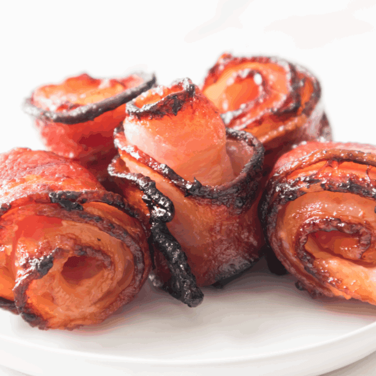 Crispy Air Fryer Maple Sugar Glazed Bacon Roses, beautifully caramelized with maple sugar, ready to serve as a savory-sweet treat.