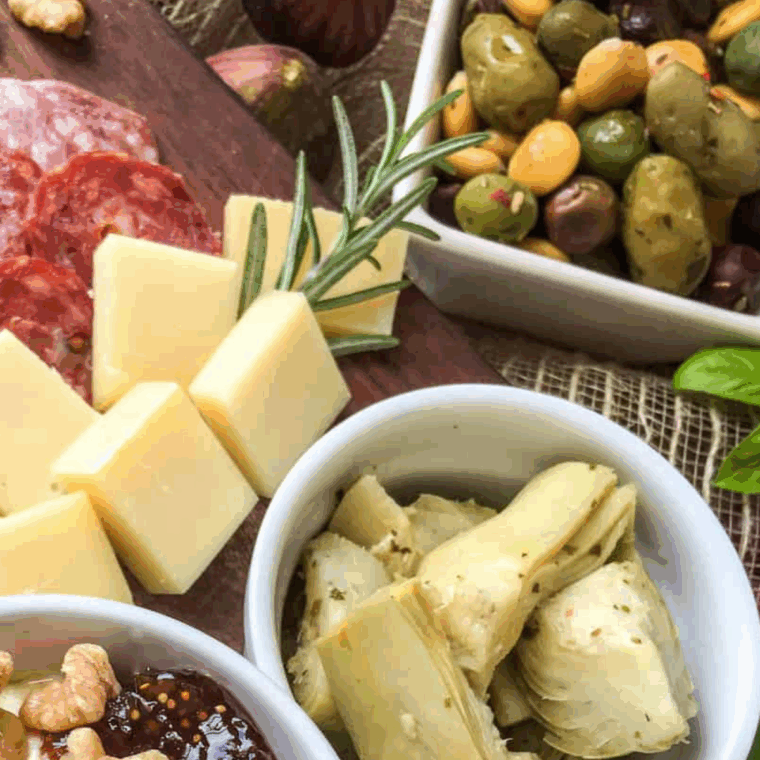 Golden, crispy air fryer marinated olives served in a small bowl, ready to enjoy as a snack or appetizer.