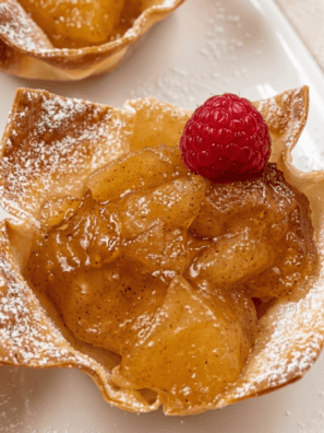 Air Fryer Mini Apple Pies use wonton wrappers and pie filling for crispy, bite-sized apple pie cups in under 15 minutes. Just 2 ingredients!