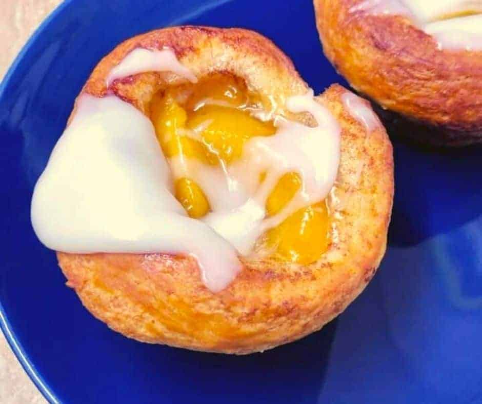 Air Fryer Peach Pie Cinnamon Rolls-- This was an effortless breakfast, and it is great with a hot cup of coffee. Air Fryer Peach Pie Cinnamon Rolls so good!
