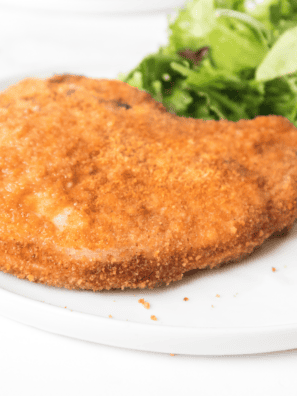 Crispy, golden Air Fryer Shake and Bake Pork Chops are ready in about 20 minutes. They come out crunchy on the outside, juicy in the middle, and need almost no cleanup &mdash; the easy weeknight dinner your whole family will ask for again.