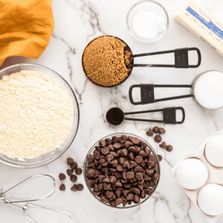 Ingredients needed for Air Fryer Single Serve Chocolate Marshmallow Cookie on kitchen table.