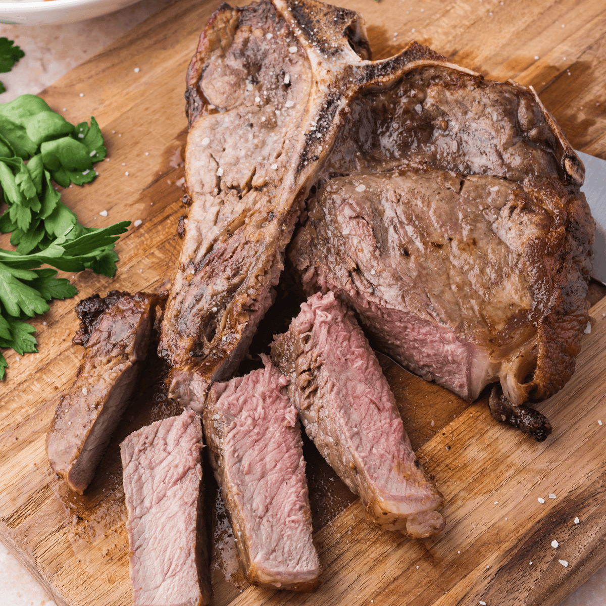 Air Fryer T-Bone Steak with a crispy crust and juicy, tender center.