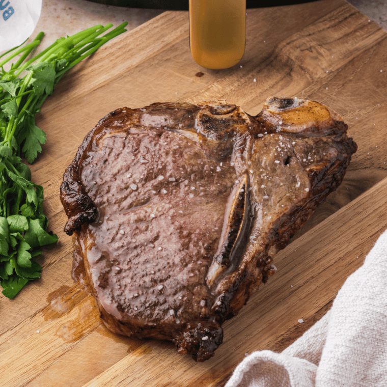 Air Fryer T-Bone Steak with crispy crust and tender, juicy interior.