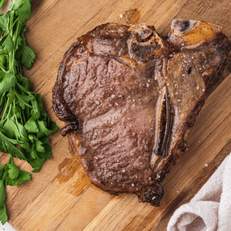 Air Fryer T-Bone Steak with golden crispy exterior and juicy, tender inside.