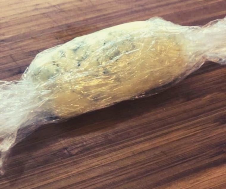 Gorgonzola butter in plastic wrap