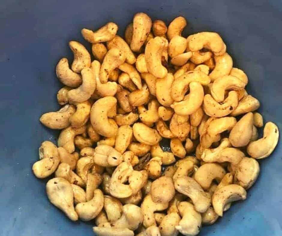 Cashews in Bowl with Olive Oil and Spices