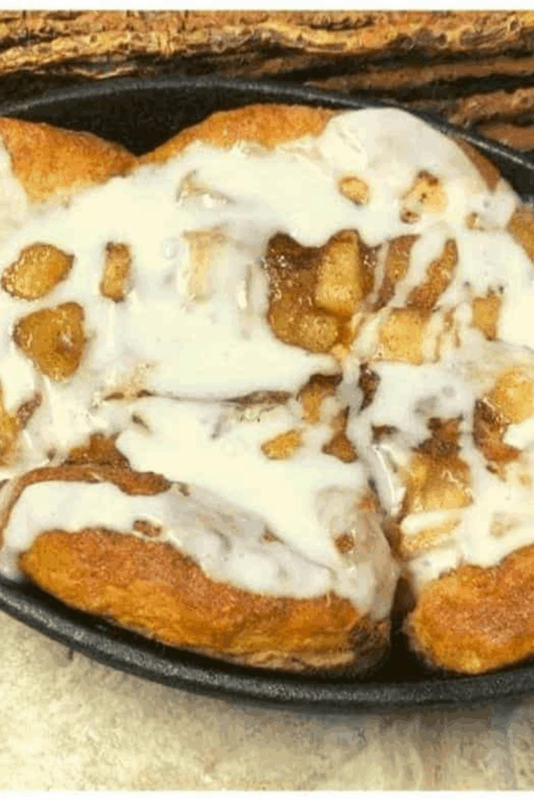 Air fryer skillet apple pie biscuit bites, golden, soft, and filled with cinnamon-spiced apples