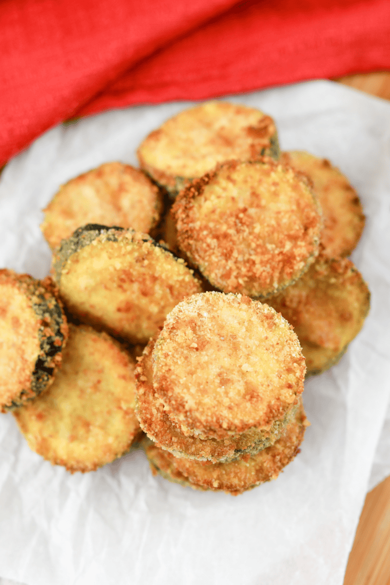 Plate of Easy Copycat Carl's Jr. Fried Zucchini Recipe on kitchen table.