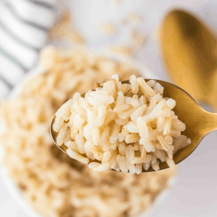 Fluffy, bright yellow rice (Goya Spanish Rice) in a bowl, ready to serve as a side dish.