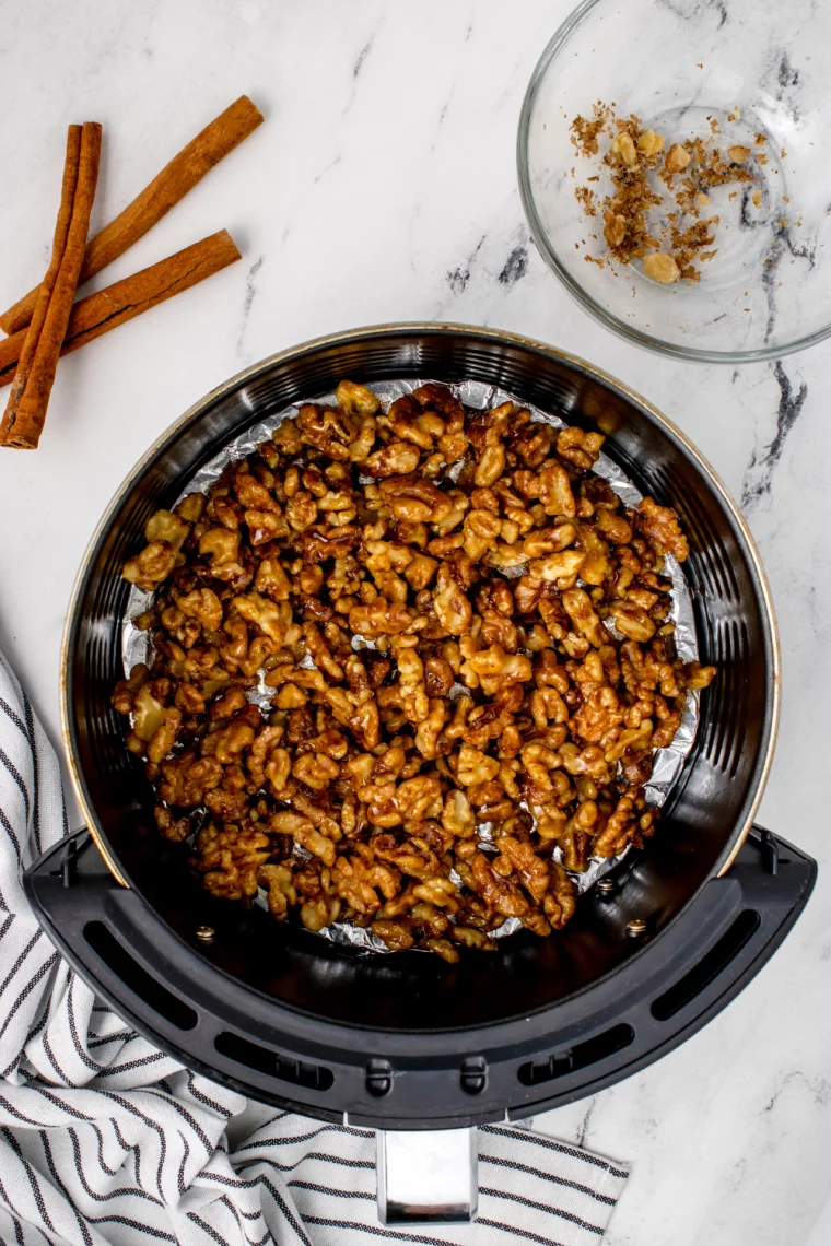 overhead: toasted walnuts in air fryer basket