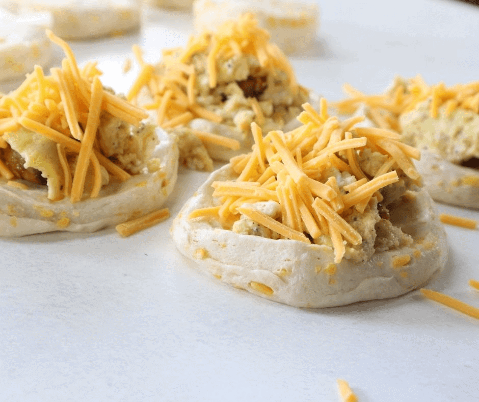 egg bombs with cheese on top