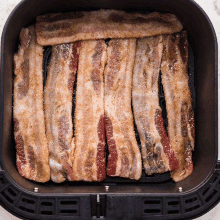 Slicing and flattening buttermilk biscuits, greasing basket or using parchment paper.