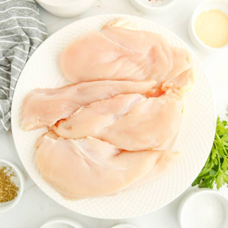 Ingredients needed for Air Fryer Copycat Cracker Barrel Grilled Chicken Tenders on kitchen table.
