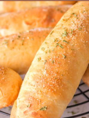 These homemade copycat Olive Garden breadsticks are soft, buttery, garlicky, and irresistibly pillowy—perfect for recreating the restaurant experience in your own kitchen.