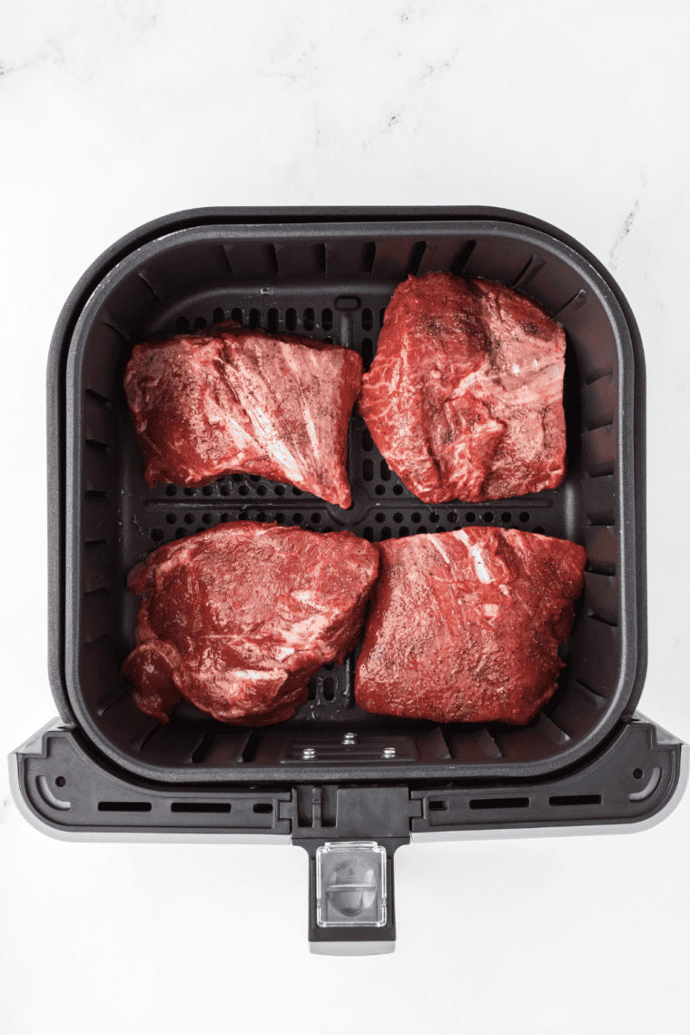 Air frying flat iron steaks for 6 minutes per side and resting before serving.