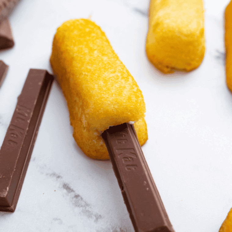 Place the candy bar into the slit.