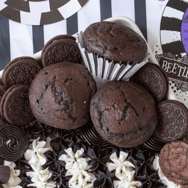 Close-up of a Copycat Costco double chocolate muffin with melted chocolate chips on top.