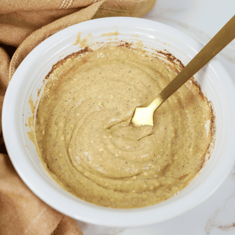 Gluten-free batter being mixed in bowl until smooth