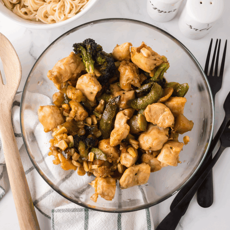 Plate of Ninja Foodi Chicken Stir Fry on kitchen table.