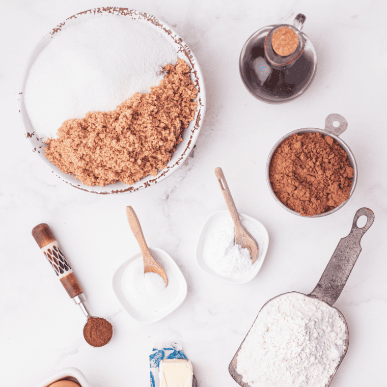 Ingredients needed for Air Fryer Chocolate Donut Holes on kitchen table.