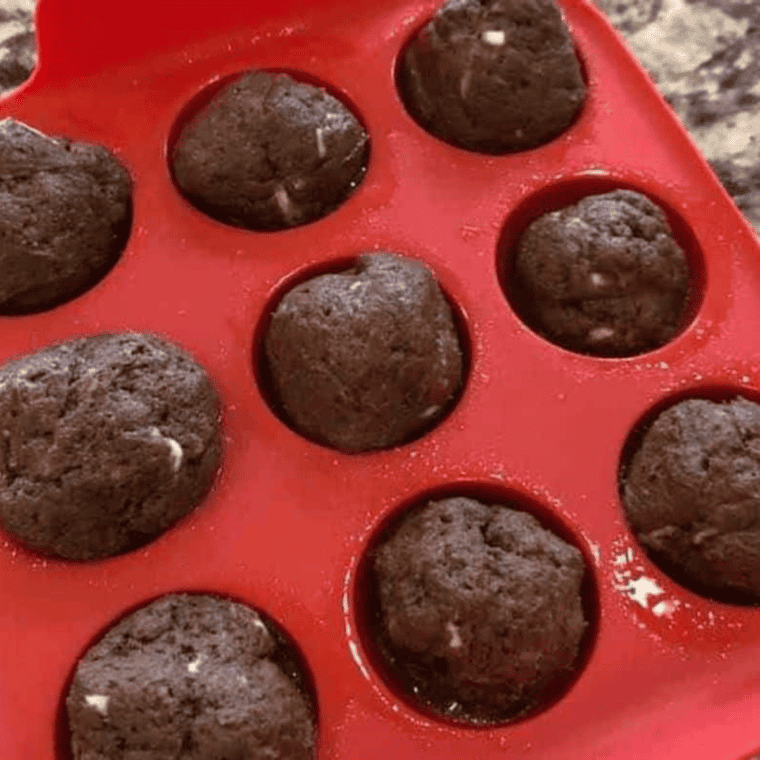 Rolling dough and placing it into the mold, then setting in the air fryer at 320°F for 10-12 minutes.