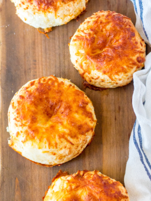 Close-up of Air Fryer Asiago Cheese Bagels – Close-up of golden-brown bagels with a crispy Asiago cheese crust.