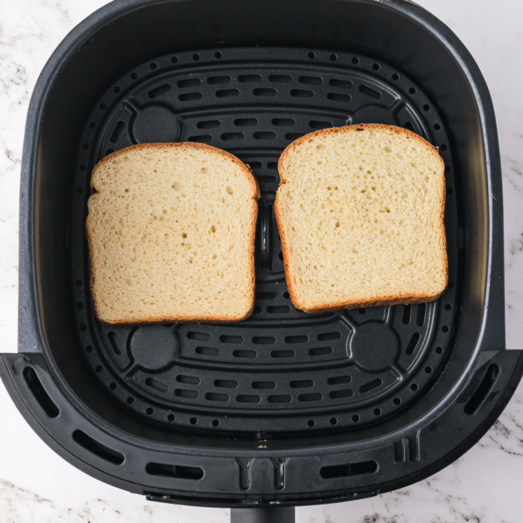 Place toast into the air fryer basket.