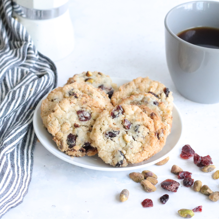 "Freshly baked Air Fryer Cranberry White Chocolate Chip Cookies cooling on a wire rack"