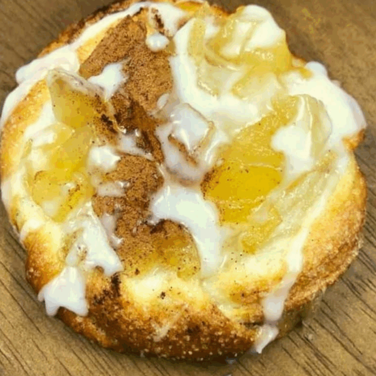 Golden, flaky Air Fryer Crescent Roll Apple Danish with a sweet apple filling, topped with powdered sugar.