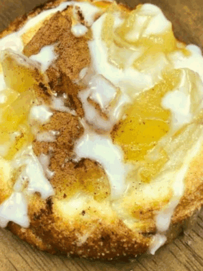 Flaky Air Fryer Crescent Roll Apple Danish with sweet apple filling, dusted with powdered sugar.